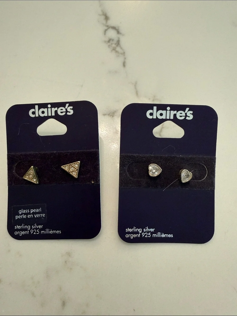 Claires Heart and Triangle studded earrings